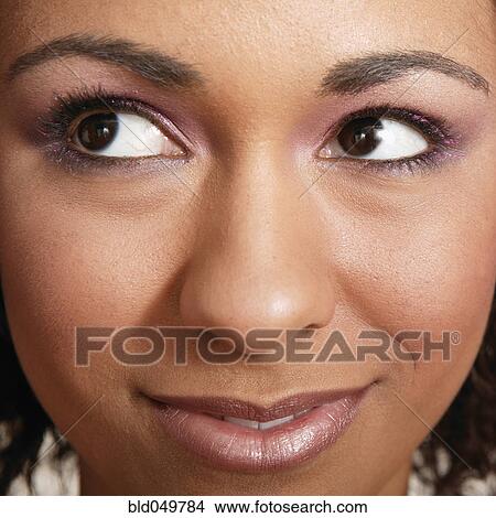 Close up of African woman’s face View Large Photo Image Picture - Close up of African woman’s face. Fotosearch