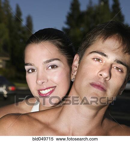 Stock Photography - Close up of Hispanic couple outdoors. Fotosearch