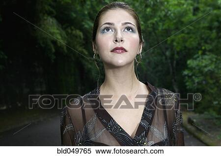 Hispanic woman on road in woods View Large Photo Image Stock Photography - Hispanic woman on road in woods. Fotosearch