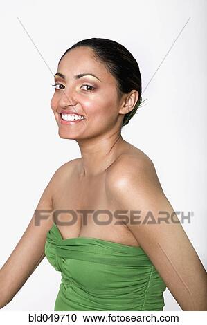 Stock Image - Indian woman wearing strapless top. Fotosearch