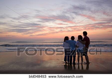 Mixed Race family at beach View Large Photo Image Stock Image - Mixed Race family at beach. Fotosearch