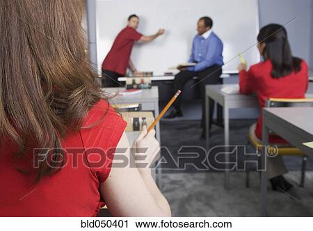 Multi-ethnic adult students in class View Large Photo Image Stock Image - Multi-ethnic adult students in class. Fotosearch