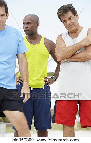 Multi-ethnic men in athletic gear View Large Photo Image Stock Photo - Multi-ethnic men in athletic gear. Fotosearch
