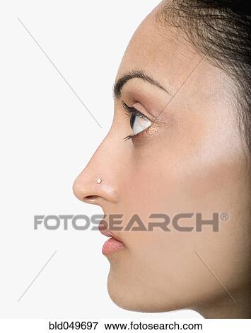 Profile of Indian woman with nose ring View Large Photo Image Stock Photo - Profile of Indian woman with nose ring. Fotosearch