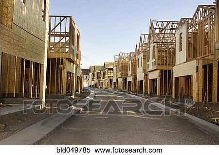 Stock Photography - Road through residential construction site. Fotosearch