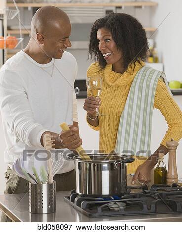 African couple making pasta View Large Photo Image Stock Photo - African couple making pasta. Fotosearch