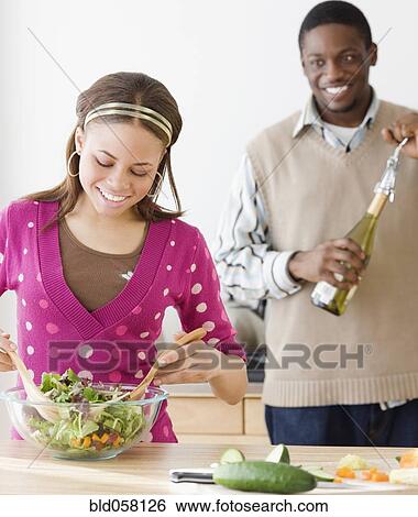 African couple preparing food View Large Photo Image Stock Photograph - African couple preparing food. Fotosearch