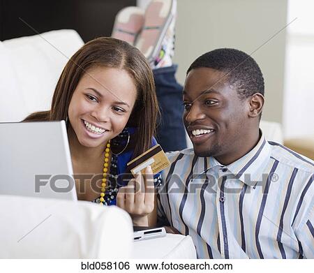 African couple shopping online View Large Photo Image Stock Photograph - African couple shopping online. Fotosearch