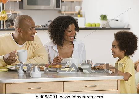 African family eating breakfast View Large Photo Image Stock Image - African family eating breakfast. Fotosearch