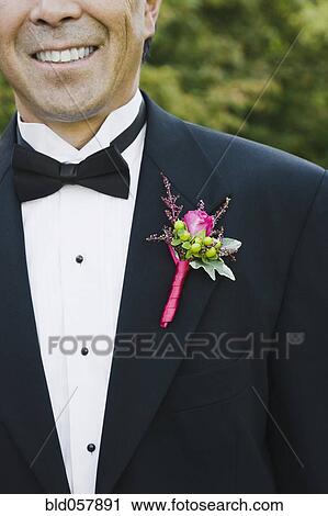 Asian man with boutonniere on lapel View Large Photo Image Stock Image - Asian man with boutonniere on lapel. Fotosearch