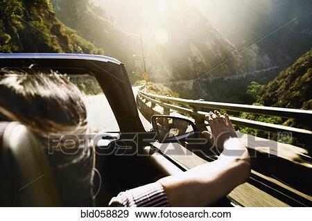 Asian woman in convertible car View Large Photo Image Stock Photo - Asian woman in convertible car. Fotosearch