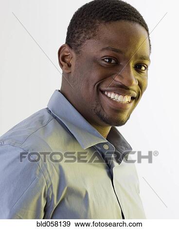 Stock Photo - Close up of African man smiling. Fotosearch