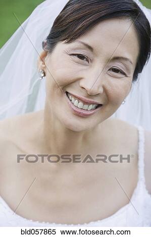 Close up of Asian bride smiling View Large Photo Image Stock Photography - Close up of Asian bride smiling. Fotosearch