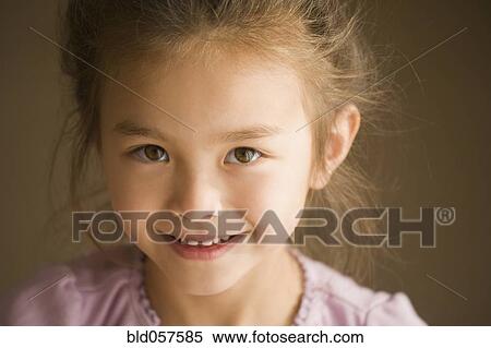 Close up of Asian girl smiling View Large Photo Image Stock Photography - Close up of Asian girl smiling. Fotosearch