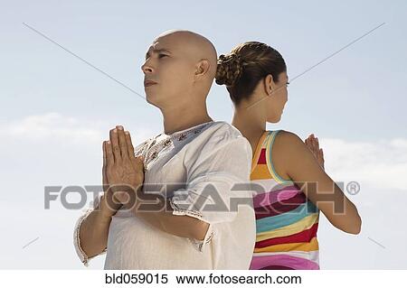 Hispanic couple practicing yoga View Large Photo Image Stock Photography - Hispanic couple practicing yoga. Fotosearch