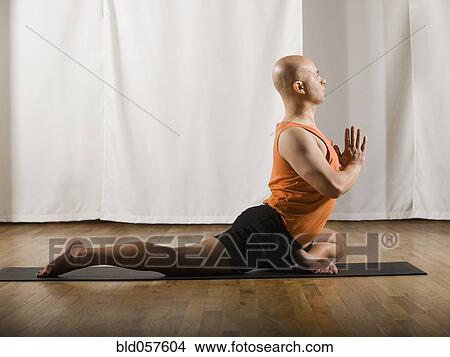 Hispanic man practicing yoga View Large Photo Image Picture - Hispanic man practicing yoga. Fotosearch