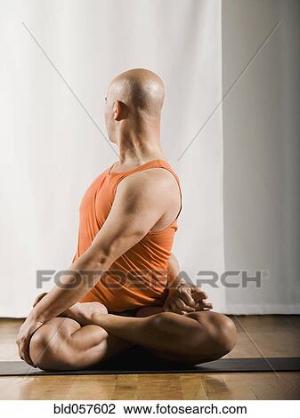 Hispanic man practicing yoga View Large Photo Image Stock Image - Hispanic man practicing yoga. Fotosearch