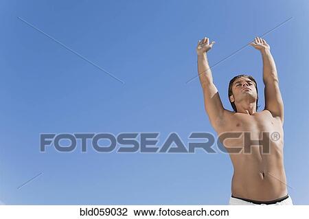 Hispanic man practicing yoga View Large Photo Image Stock Image - Hispanic man practicing yoga. Fotosearch