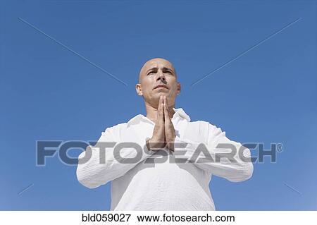 Hispanic man practicing yoga View Large Photo Image Stock Photo - Hispanic man practicing yoga. Fotosearch
