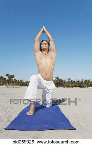 Hispanic man practicing yoga View Large Photo Image Stock Photography - Hispanic man practicing yoga. Fotosearch
