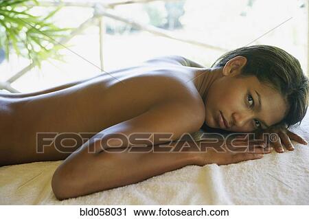 Hispanic woman laying on spa table View Large Photo Image Stock Image - Hispanic woman laying on spa table. Fotosearch