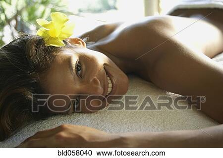 Hispanic woman laying on spa table View Large Photo Image Stock Image - Hispanic woman laying on spa table. Fotosearch
