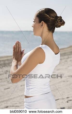 Hispanic woman practicing yoga View Large Photo Image Stock Image - Hispanic woman practicing yoga. Fotosearch