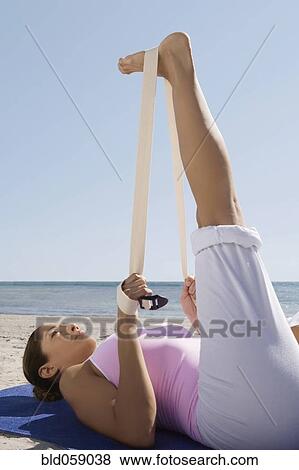Hispanic woman practicing yoga View Large Photo Image Stock Photo - Hispanic woman practicing yoga. Fotosearch