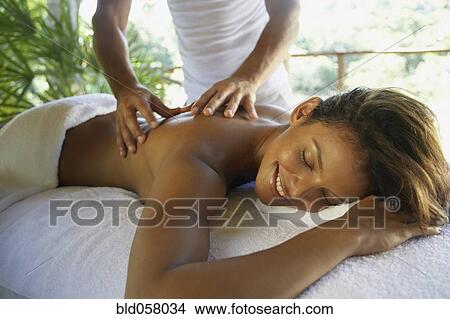 Hispanic woman receiving massage View Large Photo Image Picture - Hispanic woman receiving massage. Fotosearch