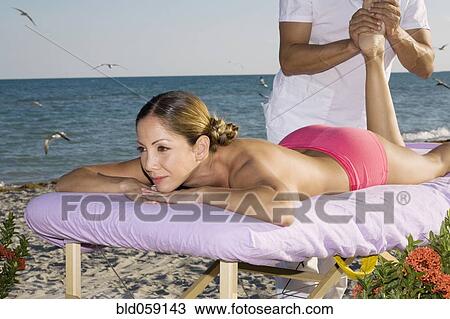 Hispanic woman receiving massage View Large Photo Image Stock Image - Hispanic woman receiving massage. Fotosearch