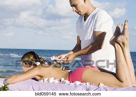 Hispanic woman receiving spa treatment View Large Photo Image Stock Photography - Hispanic woman receiving spa treatment. Fotosearch