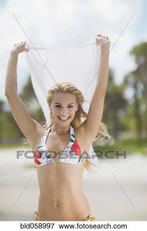 Hispanic woman wearing bikini View Large Photo Image Stock Photo - Hispanic woman wearing bikini. Fotosearch