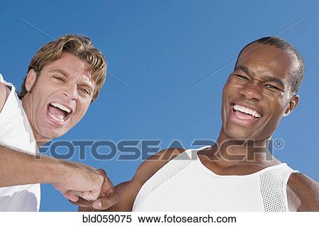 Multi-ethnic men laughing View Large Photo Image Stock Photography - Multi-ethnic men laughing. Fotosearch