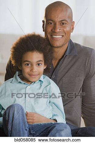 Portrait of African father and son View Large Photo Image Stock Photography - Portrait of African father and son. Fotosearch