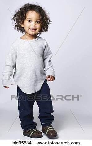 Stock Image - Portrait of Mixed Race boy. Fotosearch