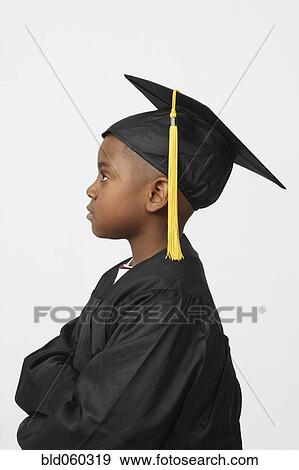 Stock Photo - African boy wearing cap and gown. Fotosearch