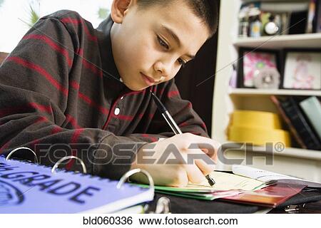 Asian boy doing homework View Large Photo Image Stock Photograph - Asian boy doing homework. Fotosearch