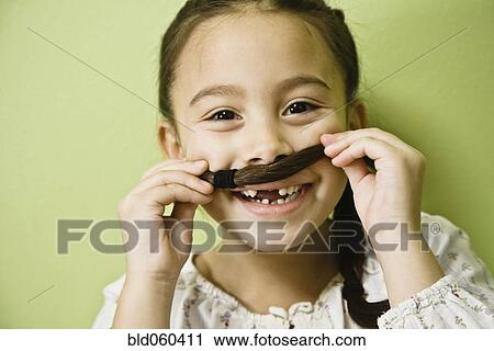 Stock Image - Asian girl being silly. Fotosearch