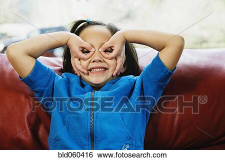 Asian girl being silly View Large Photo Image Stock Photograph - Asian girl being silly. Fotosearch