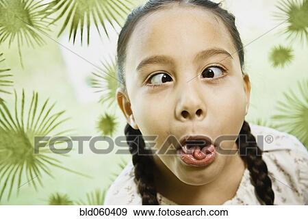 Stock Photo - Asian girl making a face. Fotosearch