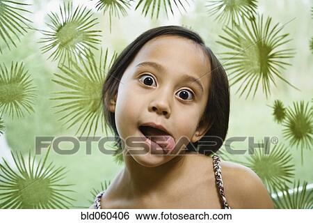 Asian girl making a face View Large Photo Image Stock Photograph - Asian girl making a face. Fotosearch
