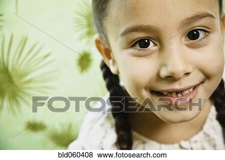 Close up of Asian girl smiling View Large Photo Image Stock Photo - Close up of Asian girl smiling. Fotosearch
