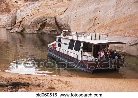 Stock Photograph - Friends on houseboat. Fotosearch