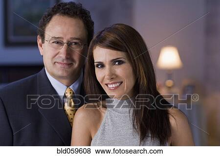 Stock Photo - Hispanic couple hugging. Fotosearch
