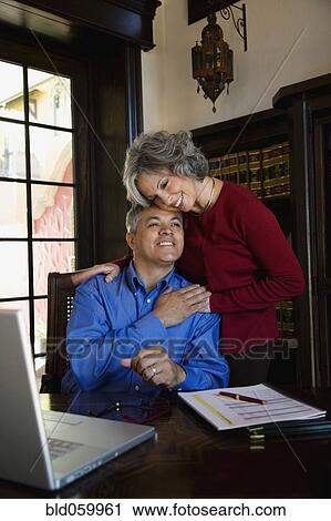 Stock Image - Multi-ethnic hugging. Fotosearch
