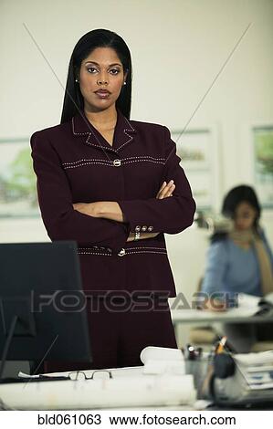 African businesswoman with arms crossed View Large Photo Image Stock Image - African businesswoman with arms crossed. Fotosearch