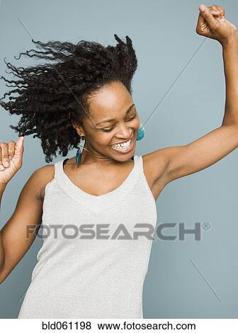African woman dancing View Large Photo Image Stock Photo - African woman dancing. Fotosearch