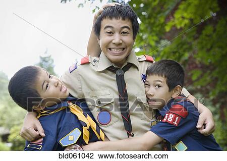 Asian brothers hugging View Large Photo Image Stock Image - Asian brothers hugging. Fotosearch