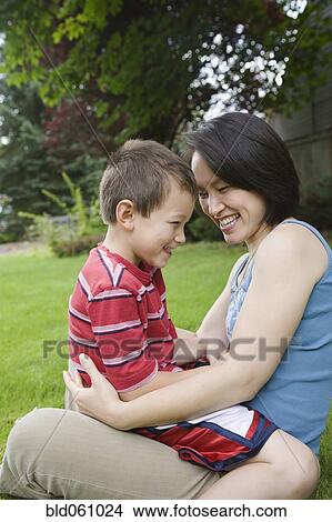 Picture - Asian mother and son laughing. Fotosearch