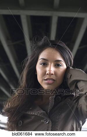 Middle Eastern woman under bridge View Large Photo Image Picture - Middle Eastern woman under bridge. Fotosearch